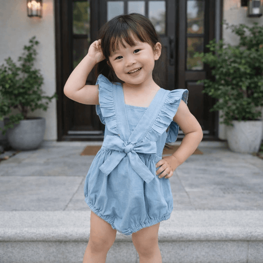 Baby Girls' Ruffle Strap Denim Romper – Sleeveless Bubble Bodysuit with Bow Detail