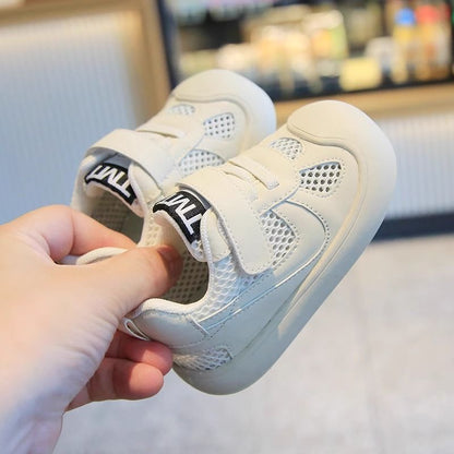 Clean-Panel Mesh Baby Sneakers with Letter Strap Tab | Breathable Velcro Shoes in White & Black
