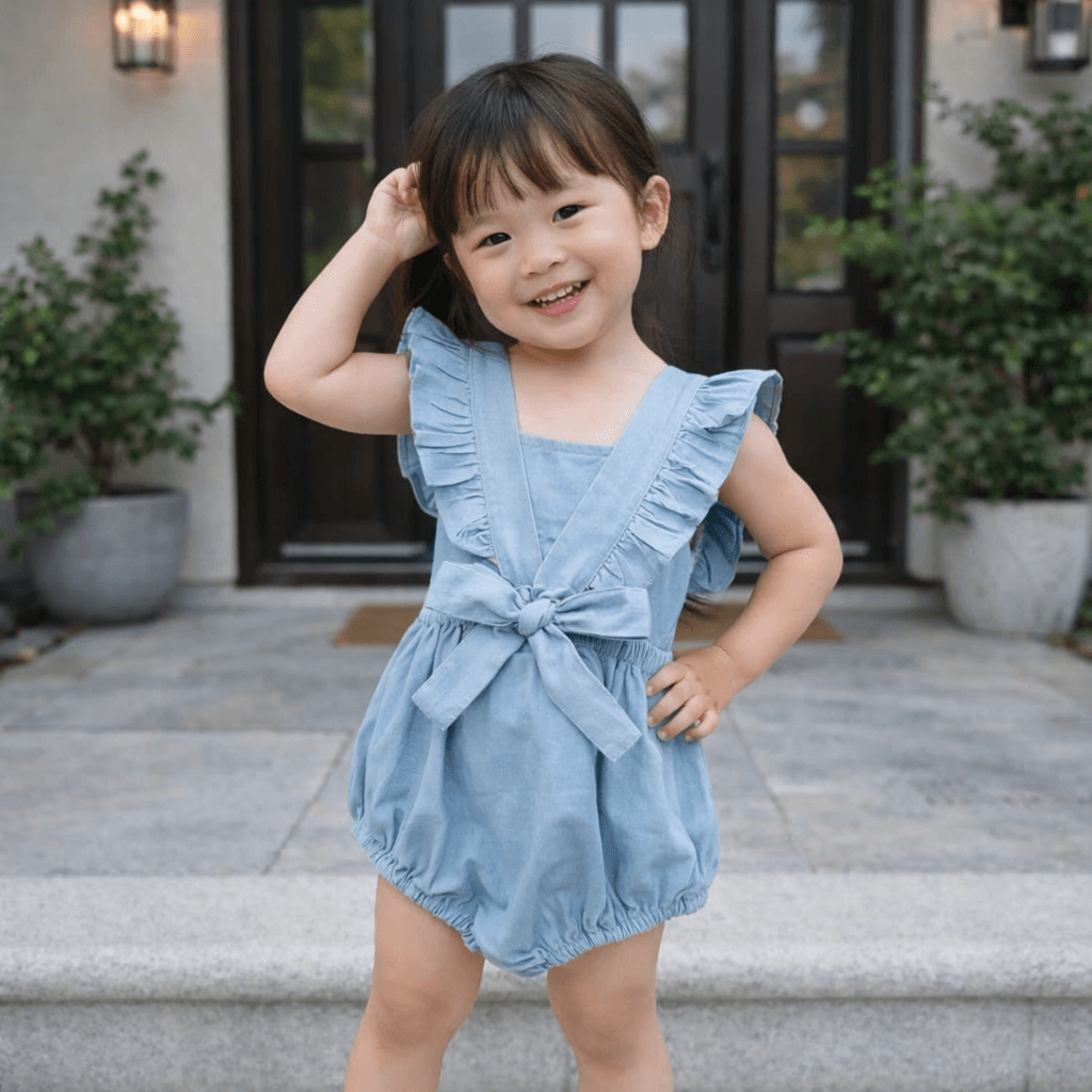 Baby Girls' Ruffle Strap Denim Romper – Sleeveless Bubble Bodysuit with Bow Detail