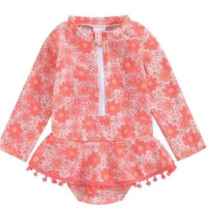 Girls' Long Sleeve Daisy Print Rash Guard Swimsuit with Pom-Pom Ruffle Skirt – Sizes 18 Months–6 Years
