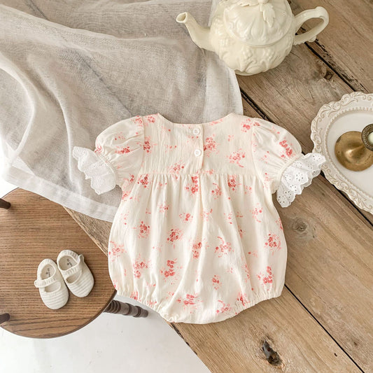 Pink Floral Puff Sleeve Romper with Eyelet Lace Cuffs – Baby Girl Summer Bubble Suit